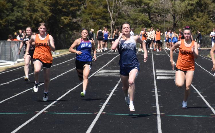 An all area showdown in the fourth heat of the 100 meters. From left to right, Osceola’s Jadelynn Gifford. High Plains’ Gahvi Lesiak, Cross County junior Ansalde Von Hackewitz and Osceola’s Camryn Peterson. PCN file photo by Beth Sparrow