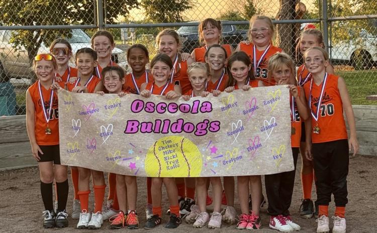 The Osceola 8-U girls softball team completed the regular season with an 11-0 record and were also league tournament champions. Front Row: Lilly Kelly, Lizzie McDowell, Eliza Leeling, Avery Bise, Vivian Carlson, Ronnie Carlson, Evelynn Leeling, Ivy Mentink &amp; Kelly Girard. Back Row: Kendall Watts, Tenley Hilger, Gianna Battle, Rayna Lassek, Hadley Michalak, Zaylee Jarosz &amp; Genevieve Lindsley. The team was coached by Tim &amp; Chelsey Girard, Mike &amp; Nicki Carlson and Treg &amp; Kalie Lindsley.