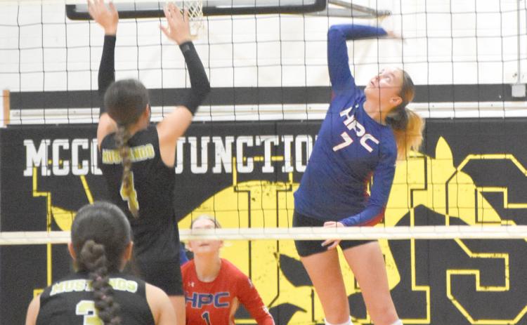 Sophomore Taya Hans (7) is on the attack as the McCool Junction Mustangs employ a single block at the net. High Plains swept past McCool Junction in CRC regular season play. PCN photo by Beth Sparrow