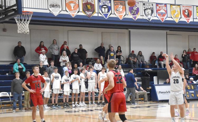 Alex Noyd sinks a pair of free throws to seal the Cross County victory over David City on Friday. PCN photo by Beth Sparrow