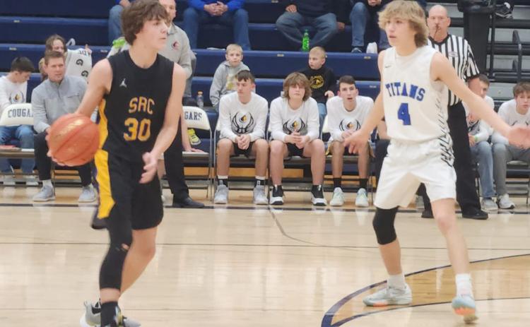 Nixon Thelen looks for the pass against Twin River on Monday. PCN photo by Craig Pinley.