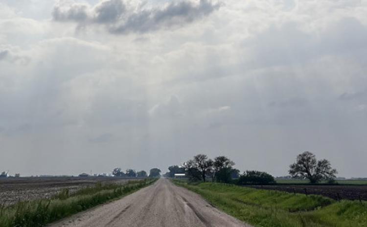 Beams of light coming through clouds in Polk County. PCN photo by Cienna Friesen.