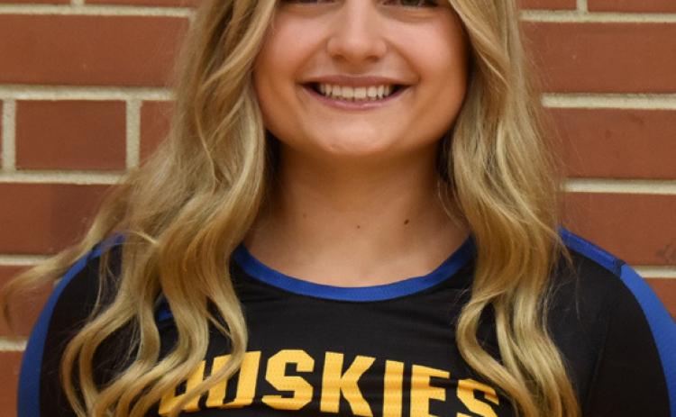 AVA LARMON - Ava led the Huskies with 21 kills and 7 blocks to claim victory over the Hawks.