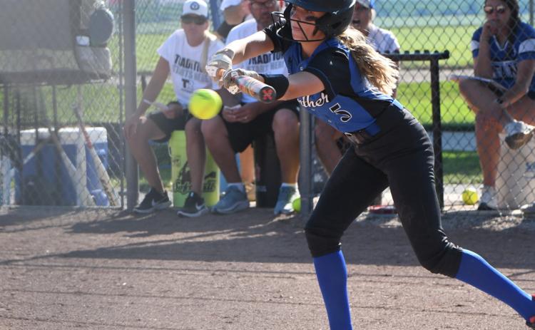 Danica Watts lays down a sacrifice bunt in the first game against Twin River. PCN photo by Rick Holtz.