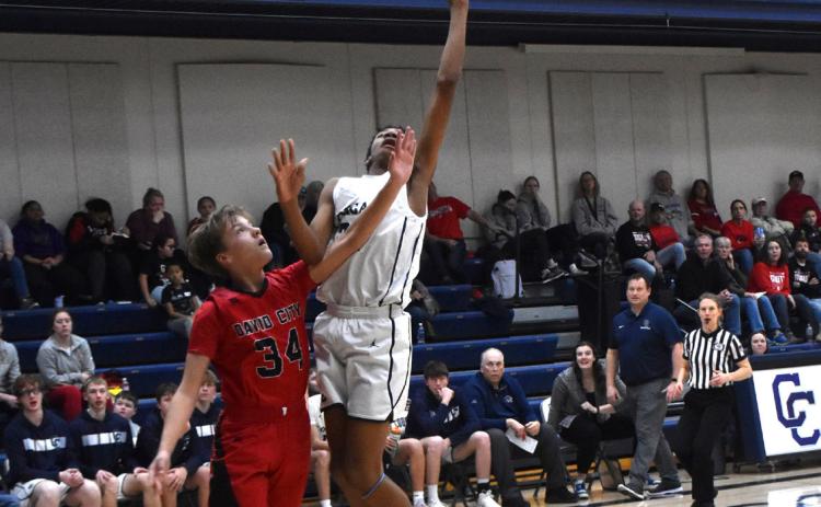 Benji Cooper goes up for the shot against a David City opponent. PCN photo by Beth Sparrow.