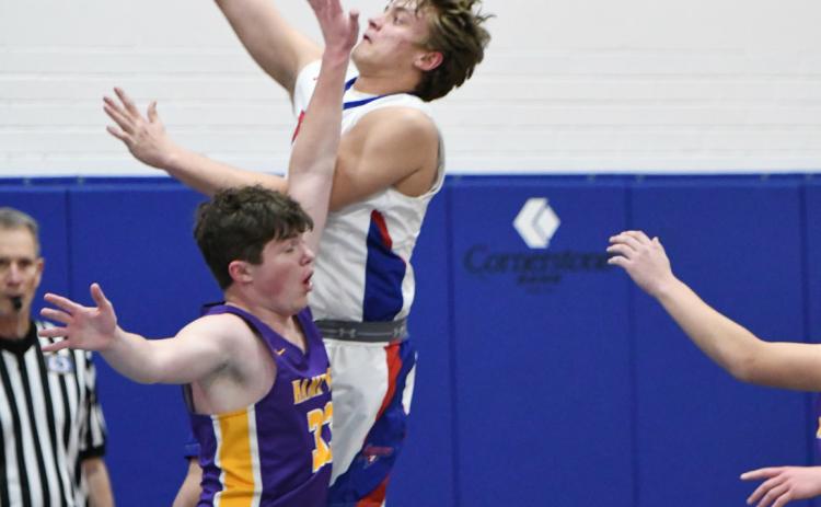 Ayden Hans goes up for the basket against Hampton. PCN photo by Rick Holtz.