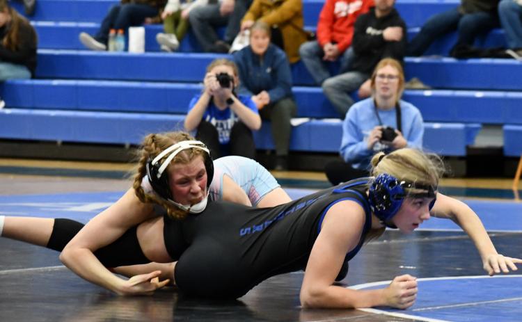 Danica Watts tries to get away from her opponent in the Lakeview dual. Photo provided by SRC School.