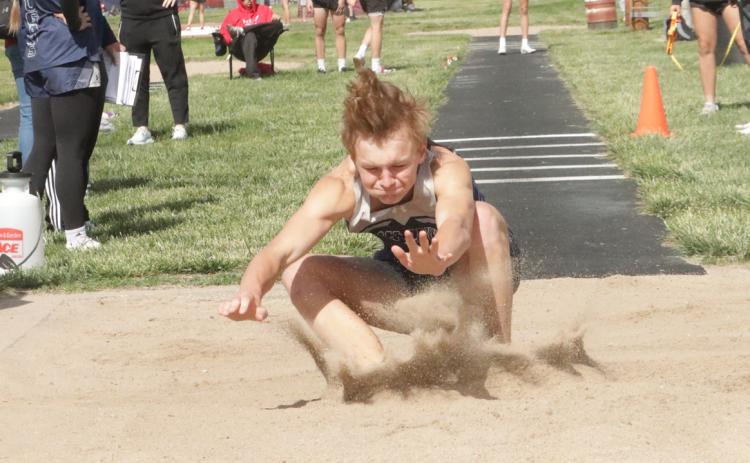 Cross County sophomore Colter Larson soared 41-06 in the triple to set a new PR and qualify for the Class C Meet in Omaha next week. PCN photo by Ken Kush