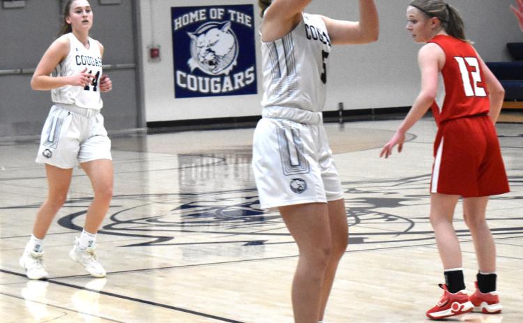 Edie Peterson takes a shot. PCN file photo by Cienna Friesen.