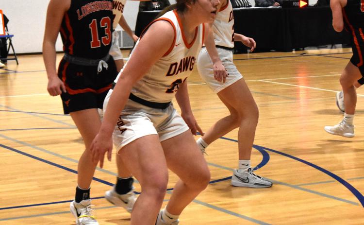Bella Recker plays defense against Dorchester PCN photo by Cienna Friesen.