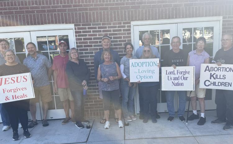 About 19 people participated in life chain on Sunday, October 4th in Stromsburg. Some left before the photo was taken. Photo provided.