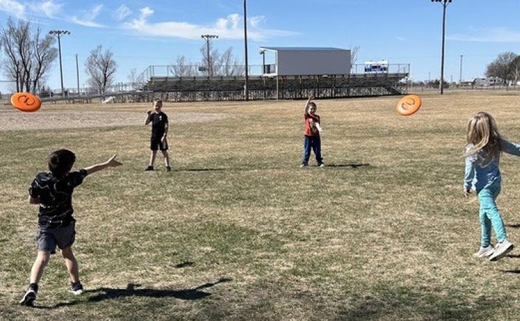 High Plains Elementary students have fun in Clarks throwing frisbees out by the football field during last weeks heat wave. Photo was provided