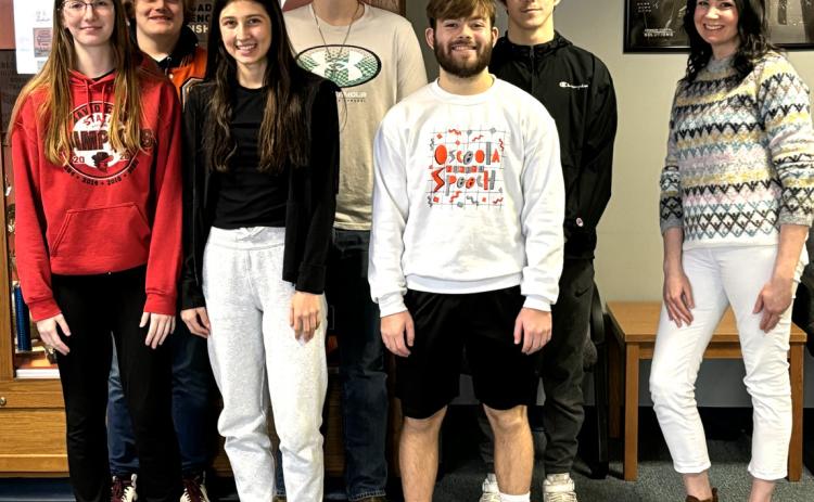 Osceola’s journalism class includes (back, left to right) Joe Meysenburg, Kaden Carlson, and Nolan Arps; and Front row Emilee Patchen, Rori Wieseman, and Matt DeMers, and teacher Allie Ray on the right. PCN photo by Lexi Reimers.