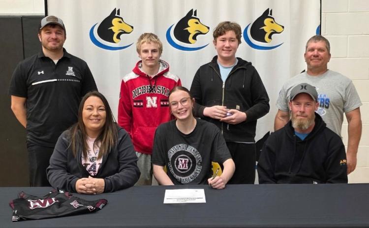 Arianna Schutt of Shelby-RC signed to attend Morningside University to continue her education and wrestle for the Mustangs. Front Row (L-R) Jenny Schutt (mom), Arianna Schutt, Richard Schutt (dad). BR- Jordan Cliff (Morningside HC), Carter Schutt, Caleb Schutt, SRC coach Chris Watts. Photo was provided.