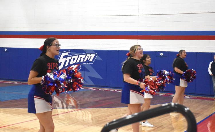 Four Storm cheerleaders were leading the students and crowd in cheers at the volleyball game against East Butler. PCN photo by Beth Sparrow.