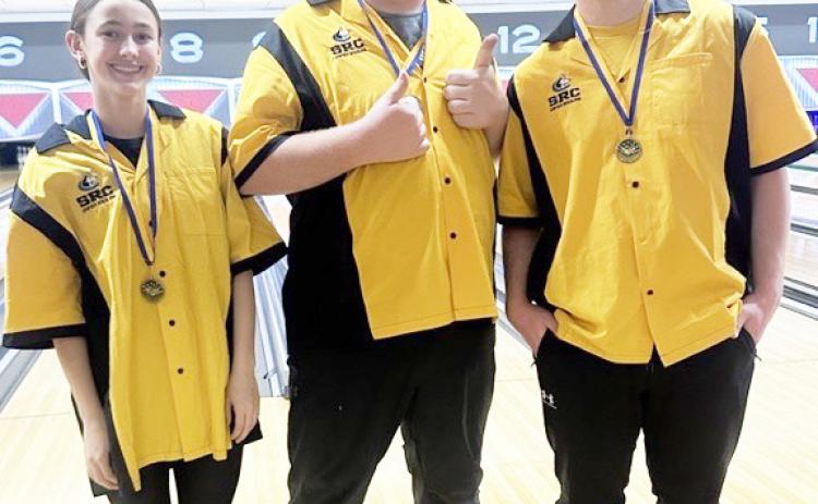 The Shelby-RC Unified bowling team of McKenna Stewart, Braxton Siffring, and Coy Stewart won first place medals at Sun Valley Lanes on Wednesday. Photo was provided