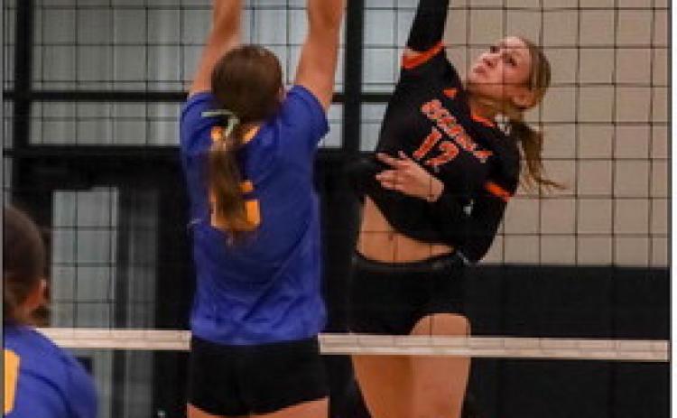 Alexis Burritt with the kill against Nebraska Lutheran. PCN photo by Blaine Winslow.