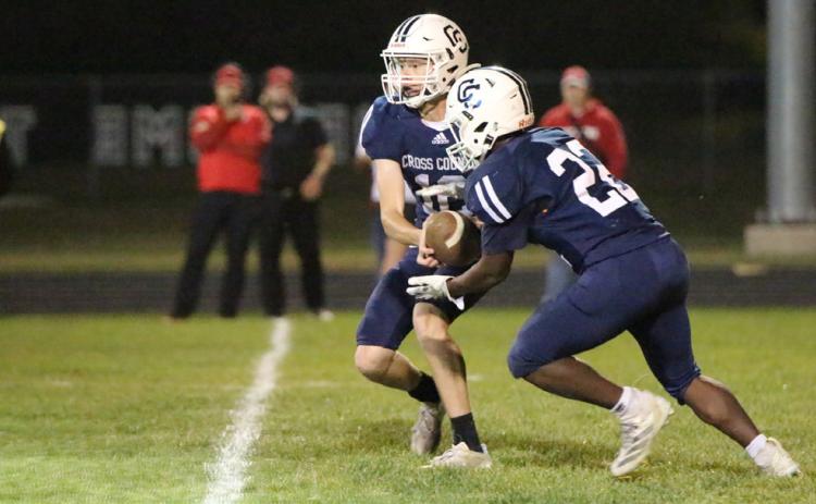 Sawyer Anderson hands off to Tymari Francis in the game against Ord. Both set new 11-man school records on Friday. PCN photo by Travis Lane.