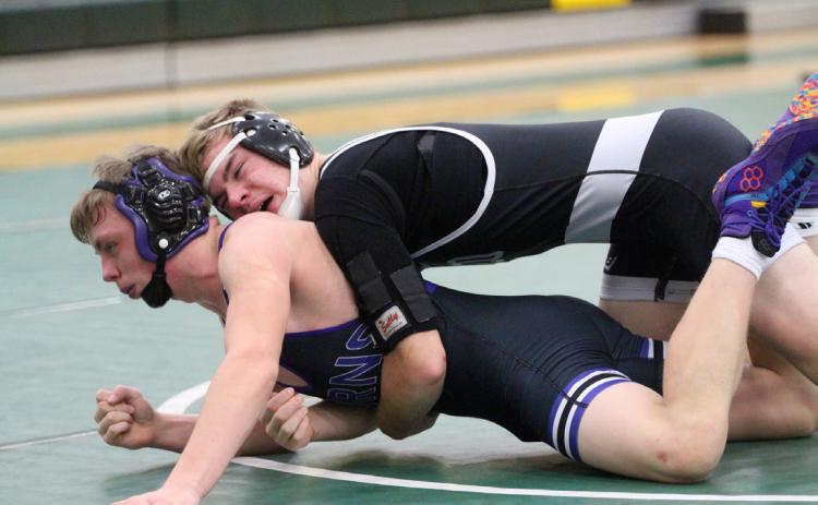 Liam White (CCO) wrestles at Kearney Catholic. PCN file photo by Travis Lane.