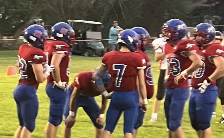 The Storm huddles to discuss the next play. Photo provided by HPC.