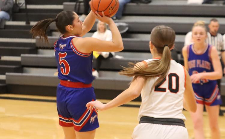 Storm senior Gahvi Lesiak (5) releases the mid-range jumper in the win over Osceola. Lesiak scored 28 against the Bulldogs and 21 in the win over BDS. PCN photo by Ken Kush.