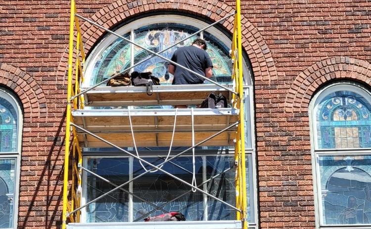 Work has begun on the window restoration project at Stromsburg United Methodist Church. PCN photo by Beth Sparrow