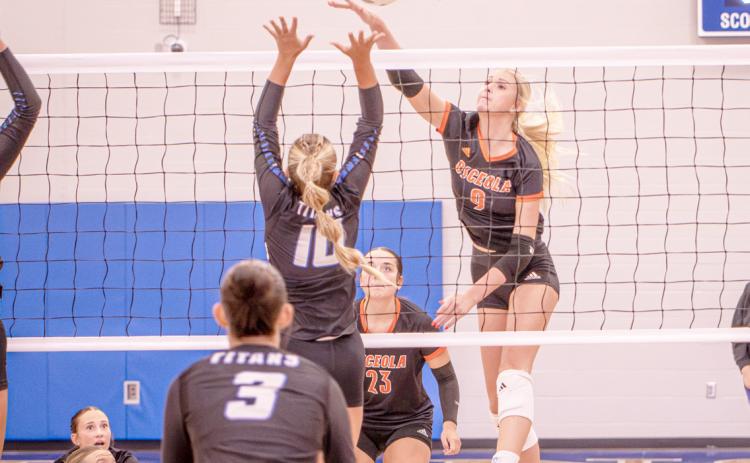 Osceola senior Kenzie Bartling (9) send the attack into the teeth of the Twin River block in Thursday action in Genoa. Bartling had eight kills in the 3-0 win. PCN photo by Rick Holtz.
