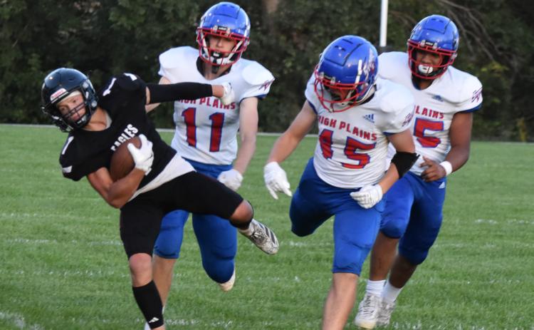 The BDS ball carrier is ushered out of bounds by High Plains defenders, Brodey Spurling (11) Chase Owens (45) and Neddy Lesiak (55). PCN photo by Beth Sparrow