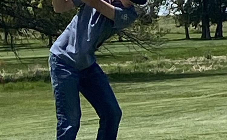 Kole Crawford takes a swing in conference play. Photo provided by Coach Blex.