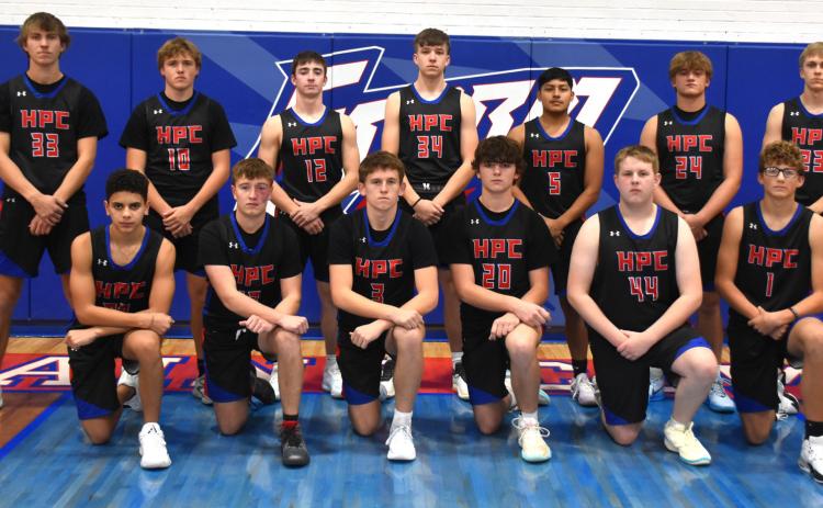 2024-25 HPC Boys Basketball team: (front) Saul Lopez-Santos, Cameron Reed, Carson Swedenburg, Kyler Hans, Leland Pike, Colin Howell; (back) Carter Urkoski, Chase Owens, Haden Helgoth, Maddix Fuhrman, Raul Marino, Ayden Hans and Brodey Spurling. PCN photo by Beth Sparrow.