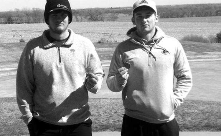 Showing off their third place medals are Trevor Micek (left) and Grant Brigham (right) of Shelby-Rising City.