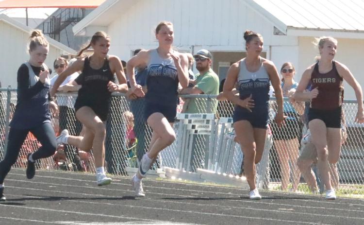 Three Cross County runners battled for the top spot in the 100 meter final. The winner (far left) was the Cougars Piyper Berggren, next to her in second place was Ansalde VonHackewitz, and next to her is Saphira Osentowski who finished in seventh place. Also pictured in Nebraska Lutheran’s Natalie Lauber and far right is East Butler’s Blaire Glassoff. PCN photo by Ken Kush.