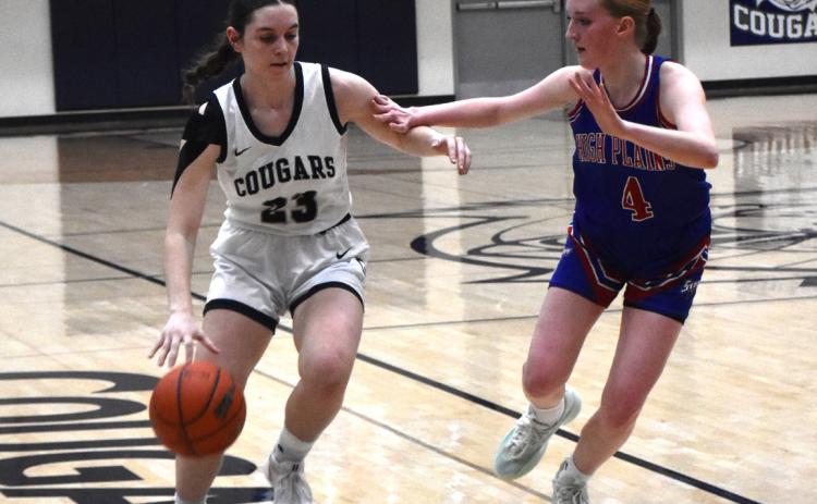 Lindee Kelley (CC) dribbles the ball while Peyton Hofmann (HPC) defends. PCN file photo by Beth Sparrow.