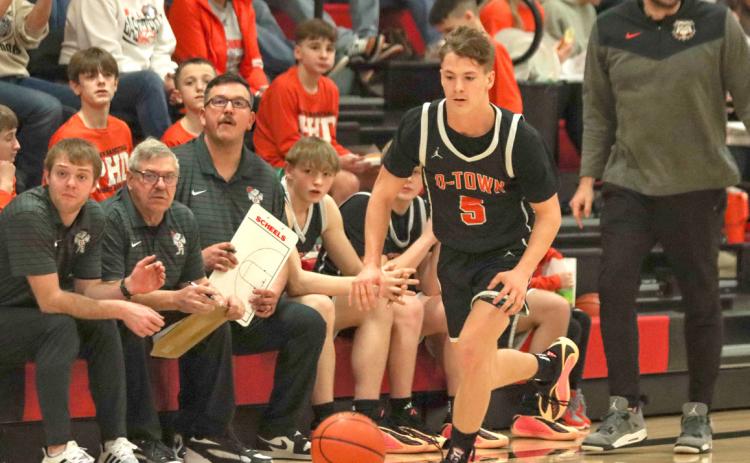 Junior guard Brycen Kula gets the steal and leads the break down court at Meridian. PCN photo by Blaine Winslow.