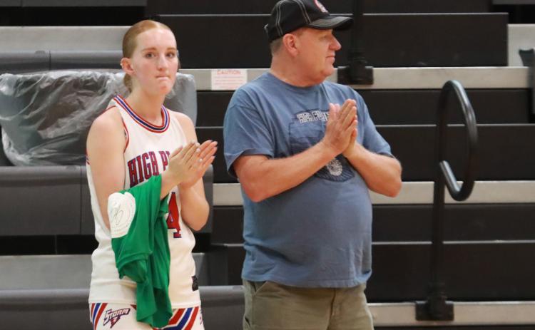 High Plains graduate Peyton Hofmann has had a busy start to her post-high school career as she has already played in three all-star games and still has two more to go with Centennial Classic Basketball on June 16 and Classic Volleyball on June 18. Fellow graduating senior Gahvi Lesiak will join her at the all-star basketball game. Here she is with her dad Tom Hofmann as she is introduced before the CRC-GRC All Star Basketball Game. PCN photo by Ken Kush