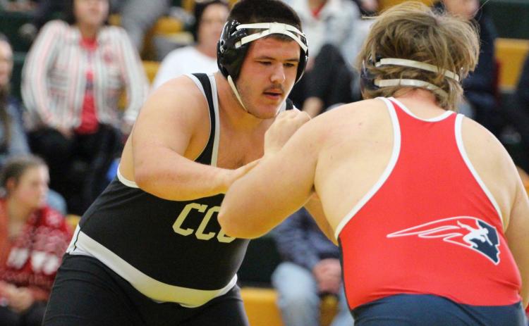Brenden Gabel wrestles an opponent at Kearney Catholic duals on Saturday. PCN photo by Travis Lane.