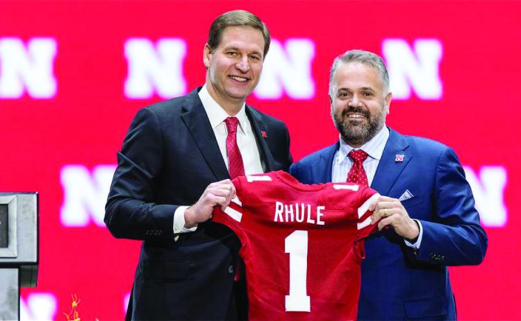 Vice Chancellor and Director of Athletics Trev Alberts (left) introduces new Head Coach Matt Rhule on Monday. Photo by Scott Bruhn/Nebraska Communications