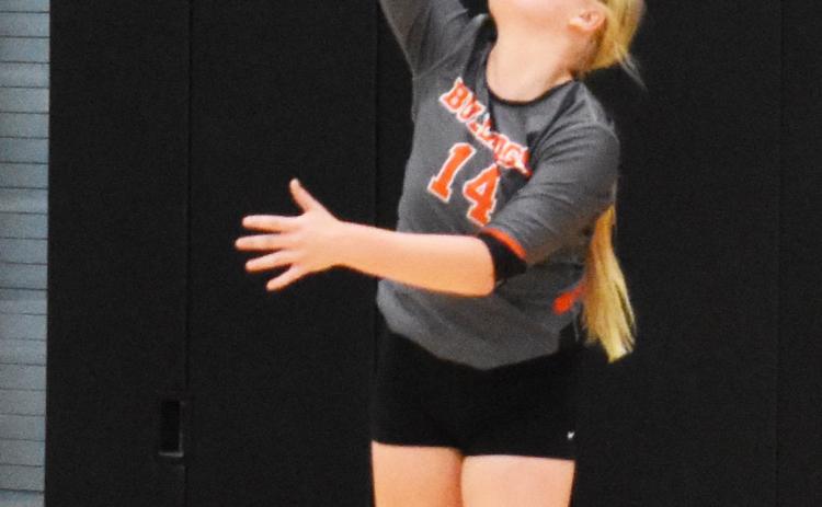 Janna Roberts serves the ball Thursday against Heartland. PCN photo by Beth Sparrow