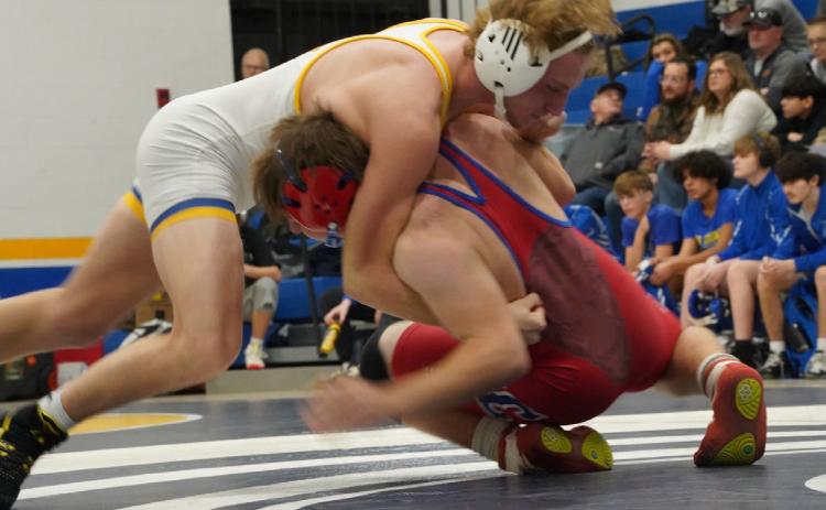 Logan Lindsley wrestles his opponent at the Tri-County duals. PCN photo by Jen Vrbka.