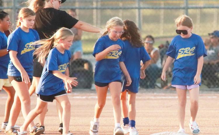 Just before the start of the Columbus Lakeview-Blue River Softball game young girls softball players from Shelby-RC, East Butler and David City were recognized. Here several SRC girls are on the field. PCN photo by Ken Kush