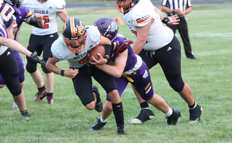 Osceola junior quarterback Jackson Winslow (2) is tackled inside the Deshler five-yard line in the second quarter of Friday nights game in Deshler. Osceola put up a balanced attack, but the Deshler run game proved to be the difference in the 42-36 loss. PCN photo by Ken Kush.