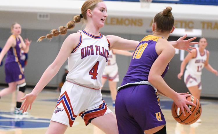 Peyton Hofmann blocks a Hampton opponent from passing . PCN photo by Rick Holtz.