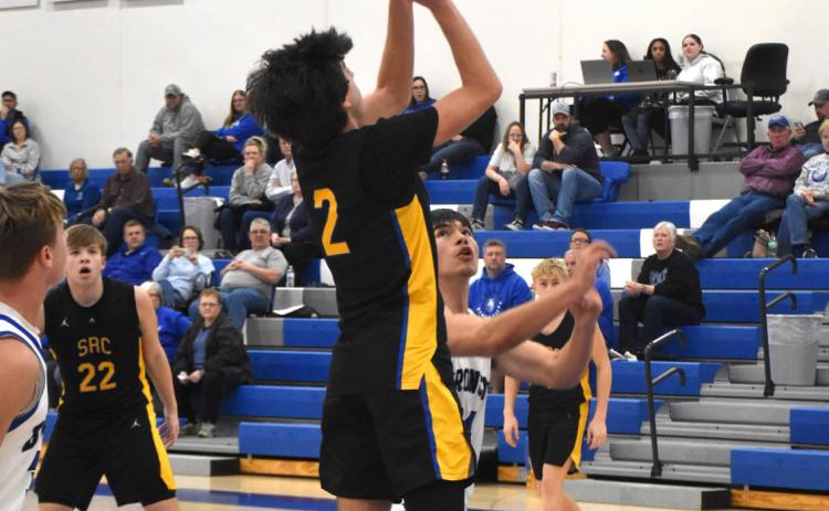 SRC’s Noah Thelen scores on the drive at Centennial. Thelen scored seven points including the wining free throws. Thelen scored 24 in a loss at Nebraska Lutheran. PCN photo by Beth Sparrow.