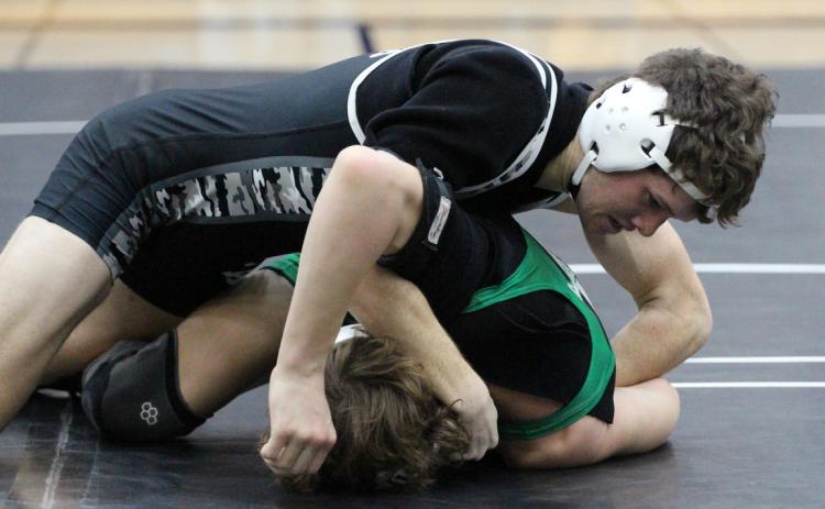 Cross County/Osceola junior Jed Berggren won his second consecutive title on Saturday at the Cross County Robert Orsborn Invite. Berggren improved to 13-1 on the year. PCN photo by Travis Lane.