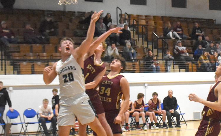Alex Noyd scored a game-high 19 points and grabbed 11 rebounds to keep the Cougars' Crossroads Conference title hopes alive. PCN photo by Beth Sparrow