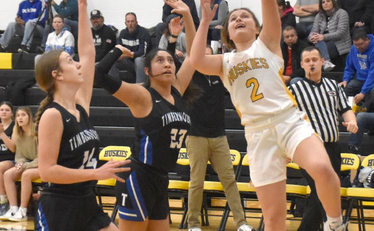 Alex Larmon goes in for a layup on Friday against Exeter-Milligan. She finished the game with nine points. PCN photo by Beth Sparrow