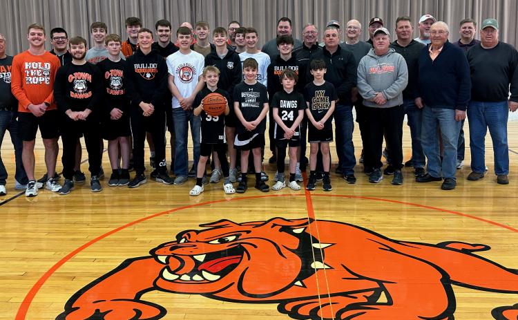 Members of the 1988 state-qualifying basketball team joined this year's squad as the Osceola community prepares to send boys basketball team to Lincoln this week as they try to bring home a state title. There was a pep rally Sunday at the Osceola City Auditorium. PCN photos by Rick Holtz