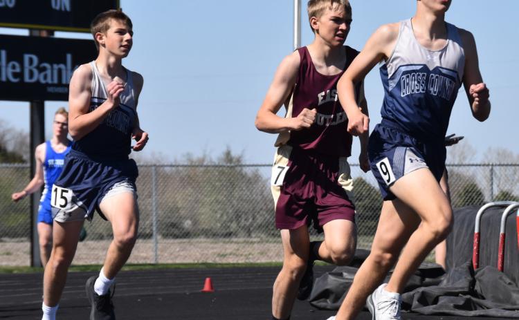 Above: Matthew Frazier (left, CC) and Revin Nyberg (right, CC) run in the 1600 meters. PCN photo by Cienna Friesen.