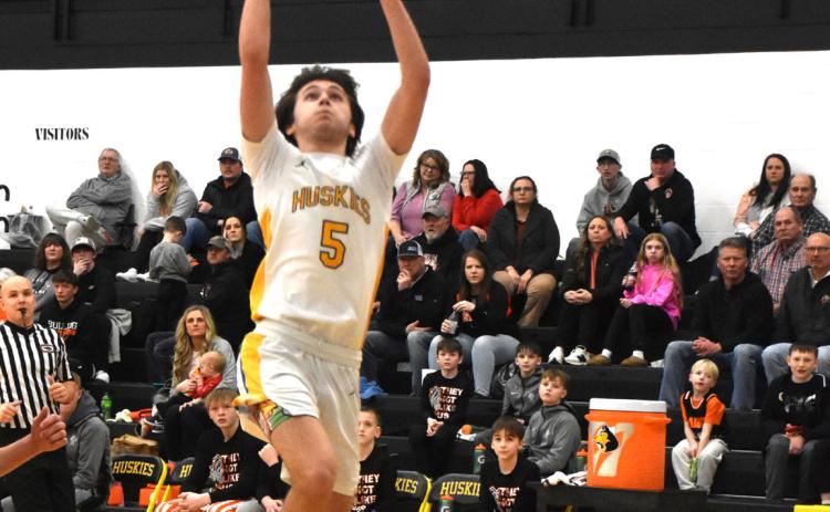 Blake Schmidt takes the ball up for layup. PCN file photo by Beth Sparrow.