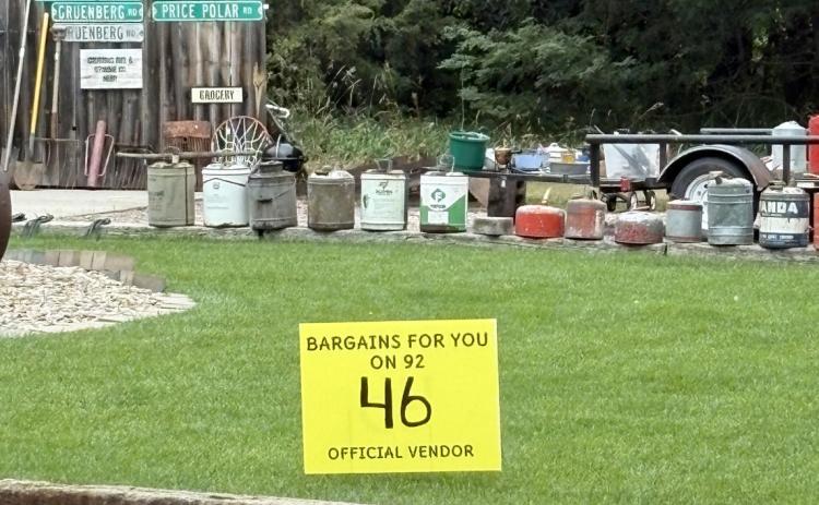 Look for these yellow signs for Bargains for You on 92 from August 27-29. PCN file photo by Beth Sparrow.